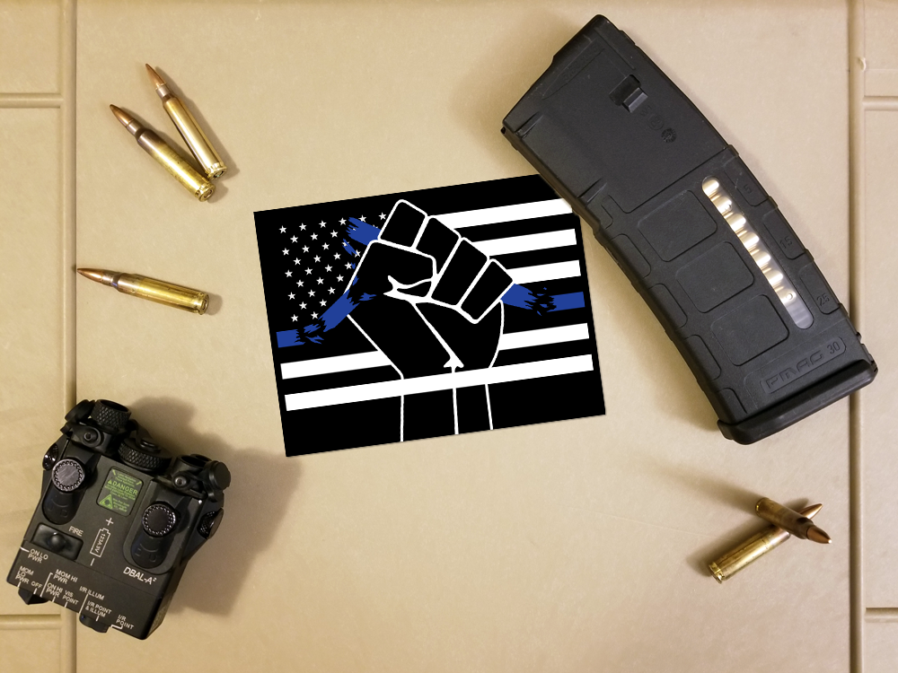 Fist smashing through the blue line on a thin blue line American Flag
